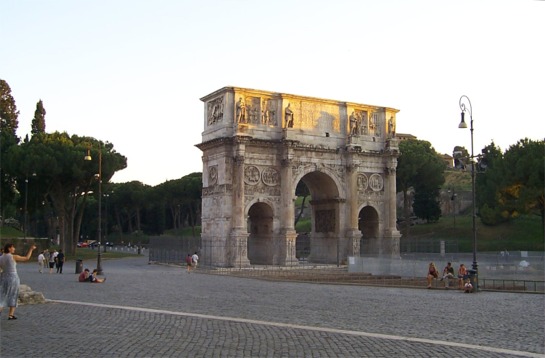 Adjacent to the Colosseum is the Arch of Constantine, the first Roman Emperor to fight in the name of Christ.  It was built in the 4th century AD to commemorate Constantine's tenth year in power.