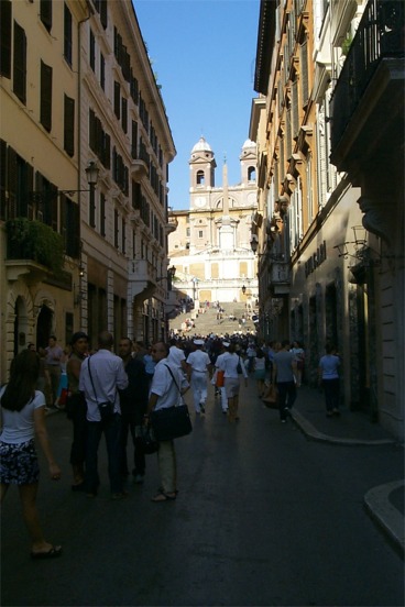 Walking towards Piazza di Spagna and the Scalinata di Trinità dei Monti (Spanish Steps).