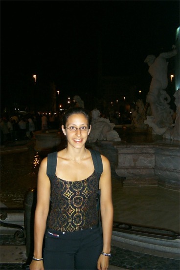 Rachel next to the fountain.  Piazza Navona is considered one of Rome's showpiece attractions.  At night there were hundreds of people out at the various outdoor restaurants that line the square.