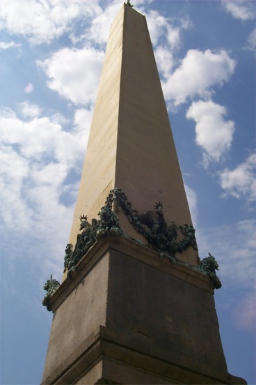 A large obelisk in the center of Piazza San Pietro.  The piazza was finished in 1667 after only 11 years of construction.  