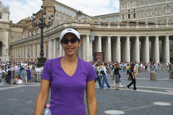 Rachel in the Square.  The Piazza can hold 400,000 people and is surrounded by a curving pair of quadruple colonnades that are topped by a balustrade and statues of 140 saints.