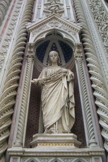 Sculptures on walls of the church.  Notice the intricate detail in the marble columns.