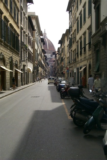 Unfortunately you were not allowed to take photos in the Galleria dell´Accademia so I have no photos of Michelangelo's original statue.  This shot was taken looking down a Florence street towards the Duomo.