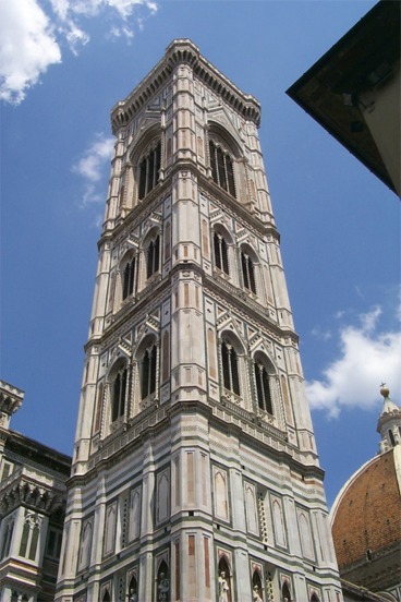 The Camponile (Bell Tower).  279 ft tall and still 19 ft shorter than the neighboring Duomo.  Construction started in 1334 and was completed in 1359.  The exterior is covered in the same marble from the Duomo: white marble from Carrara, green marble from Prato, and pink marble from the Maremma.