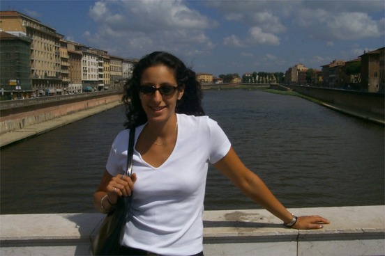 Rachel crossing the Arno in Pisa on our way to see the tower.