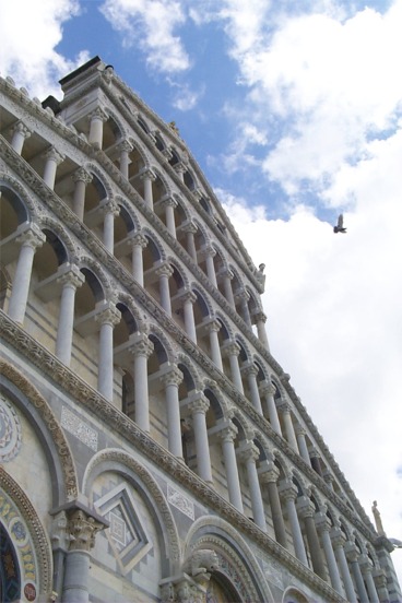 The Battistero (Baptistery).  The Leaning tower is in an open piazza called Campo dei Miracoli that contains the Duomo, Battistero, Camposanto, Museo dell´Opera del Duomo, Museo delle Sinopie, and the Leaning Tower.