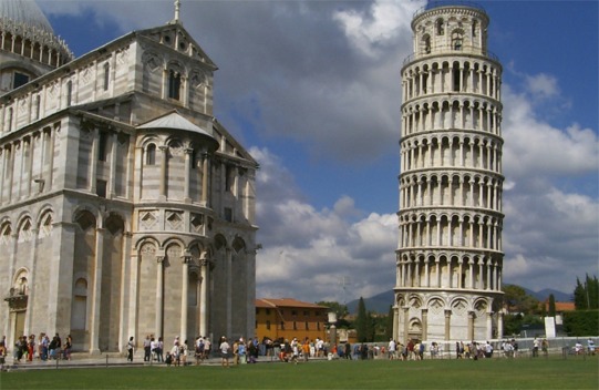 ... The tower is really a story of poor zoning.  It was started in 1174 and started leaning almost immediately as it is basically sitting on a sandy lot.  It was built over a few centuries and in the final stages they actually tried to compensate for the lean by making the one side taller than the other, but this only aggravated the situation by adding weight to the leaning side.