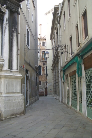 ... there were performances going on each night in Venice, none of which required tickets to be purchased in advance.  Here looking down the alley-way next to the school. ...