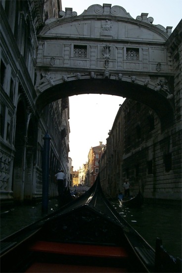 Our gondola ride!  Here the Ponte de Sospiri (Bridge of Sighs).  Supposedly named after the sighs of prisoners that could be heard in the prison directly to the right as they were led to their executions during the inquisition.  Apparently though it was given this name long after the inquisitions.