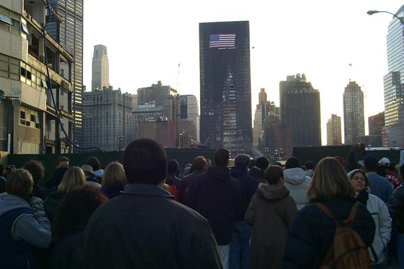 The wreckage area was blocked off about a block in every direction around the site.  Here you can see the huge gouge in the building that was opposing the towers.