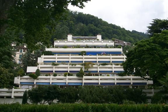 Interesting building with flower beds on each floor.