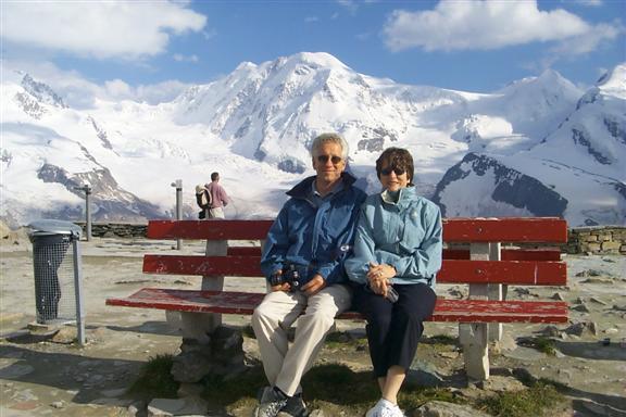 Parents taking a little rest while taking in the view.