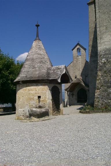 The town of Gruyère is a walled city with a castle at one end.  Here are a couple building outside the castle.