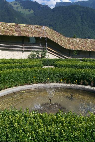 Fountain in the center of the garden.