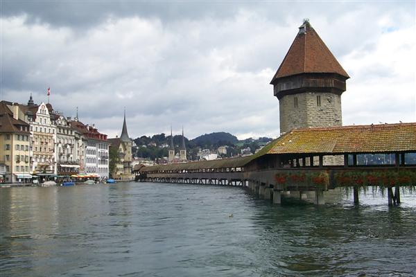 The Kapellbrücke, the oldest wooden bridge in Europe.  Built in the early 14th century it marks the division between Lake Lucerne and the Reuss River.