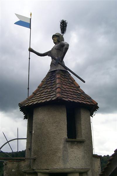 Figure on a tower in the Old Town Wall.
