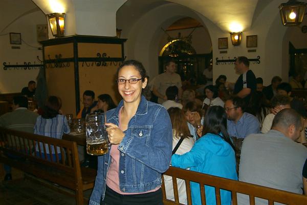 Rachel, not exactly ready to control heavy equipment, enjoys the final remains of the largest beer she ever drank.