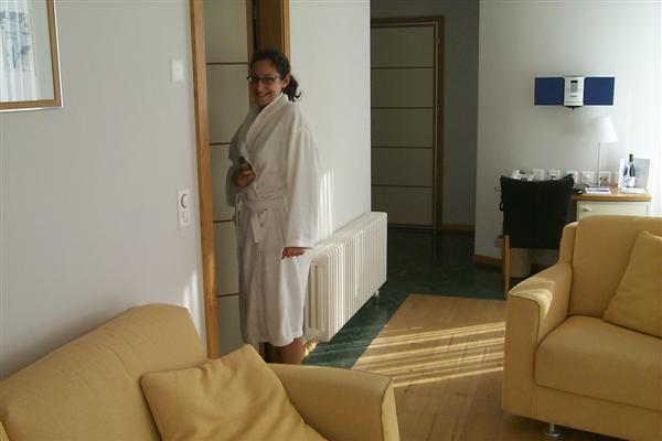 Rachel in our suite at the Cœr Des Alpes, with luxury bath robe.