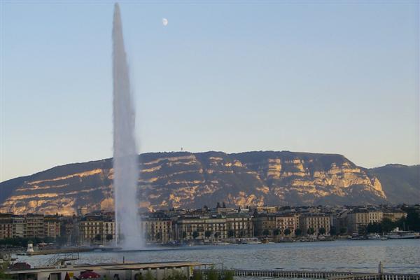 Jet d'Eau with the moon in view.