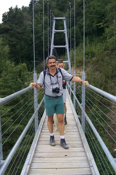 Alain, with Cookie and Paul close behind.  Paul's dog, cookie, didn't really like the bridge and only made half way across before stopping completely.