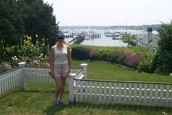 Rachel in front of a neat little fence in a lawn along the street.  Pretty tough life they have on the island.