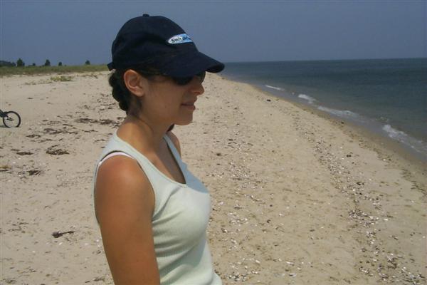 Rachel on the beach near the lighthouse.