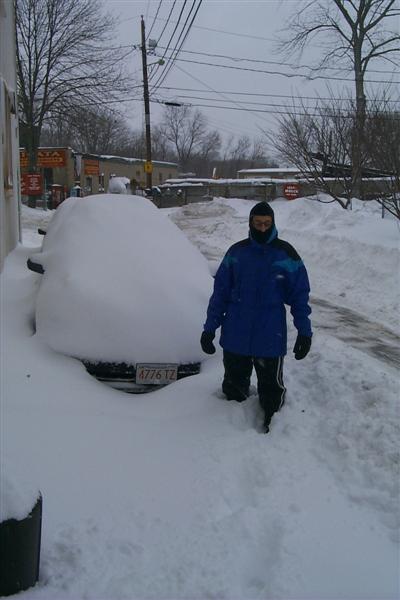 Rachel in front of her car