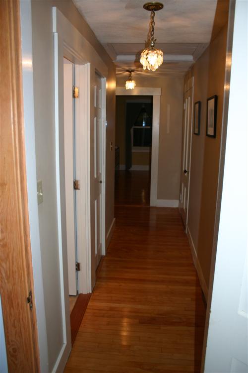 Second floor hallway looking from rear guest room