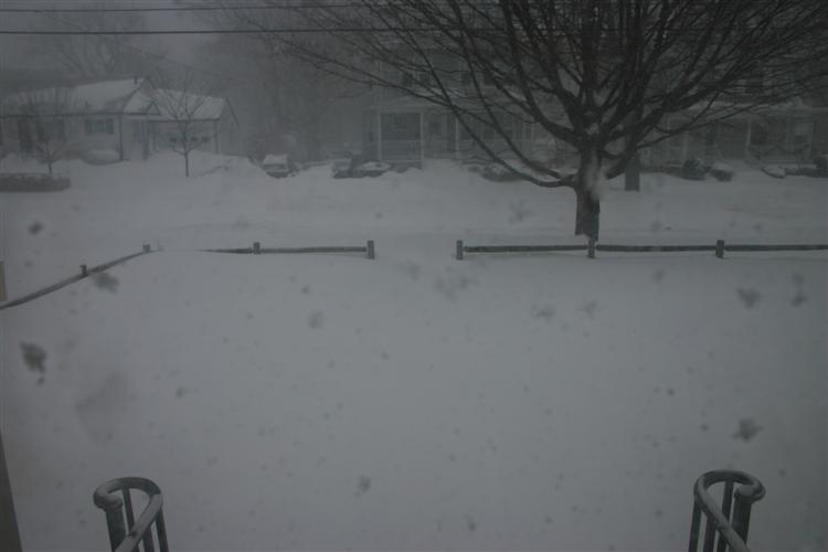 Snow in front yard.  Fence buried nearly to top rung.  I would fence is 3 feet high.