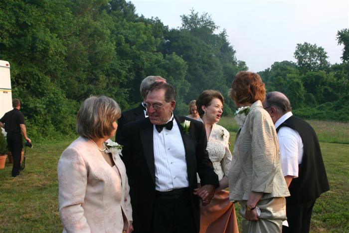 This is Joseph's father, Joe, with Joesph's step-mom on the left and mother on the right