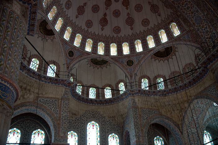 Inside the Blue Mosque.  The intereior is covered with 20,000 handmade ceramic tiles.