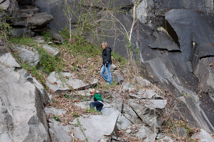 Chris and Evan scaling the rocks